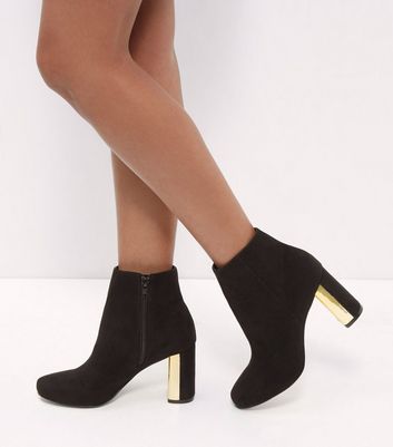 black metal trim chelsea boots