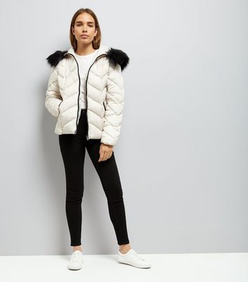 cream puffer coat with fur hood