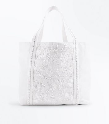 white woven shoulder bag