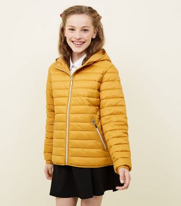 mustard hooded puffer jacket