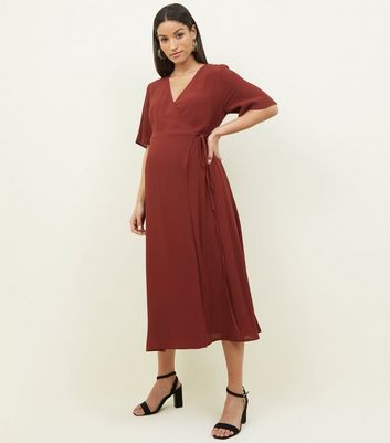 new look midi wrap dress in rust
