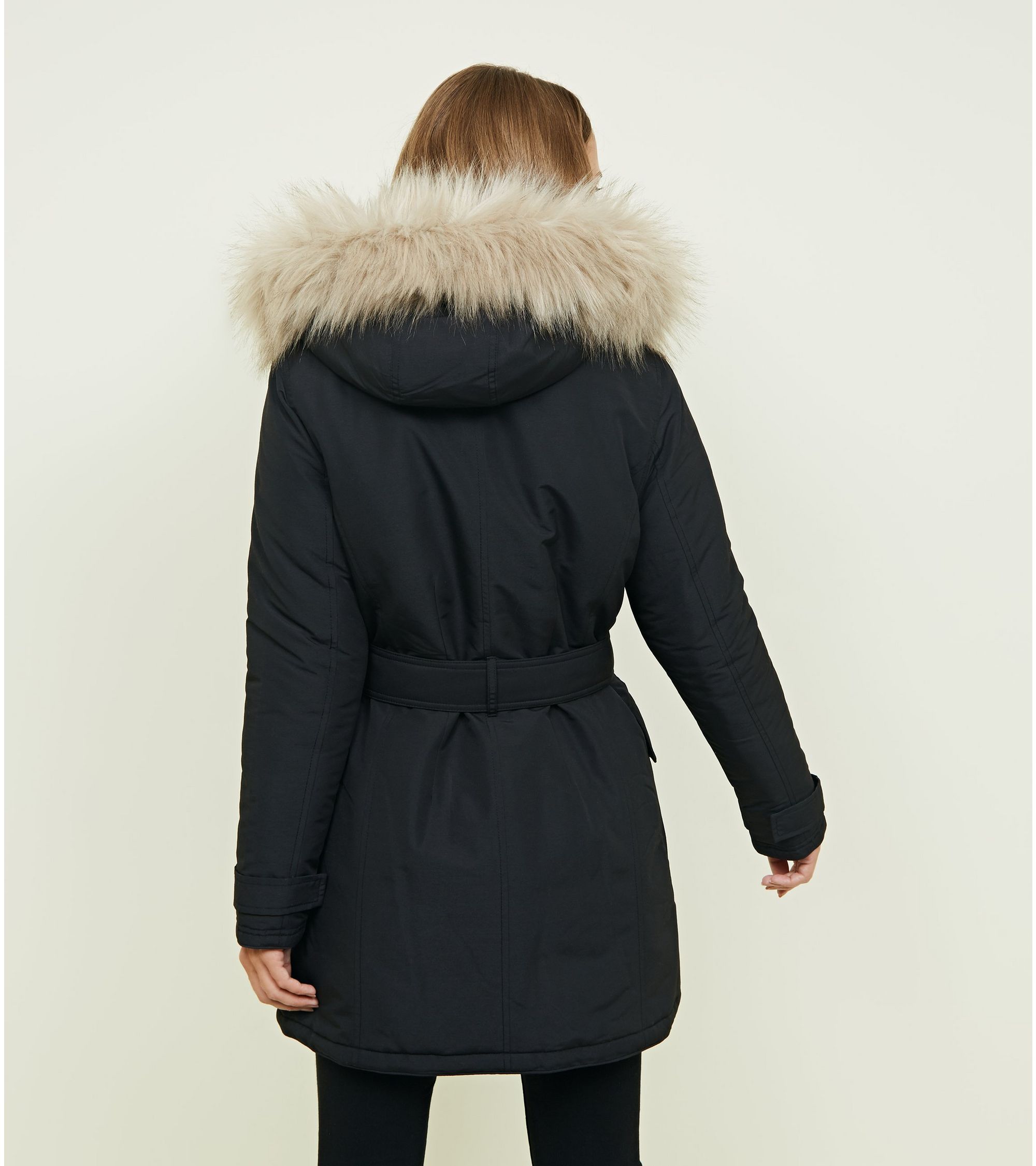 New Look Black Faux Fur Hood Belted Parka Jacket at £59.99 | love the