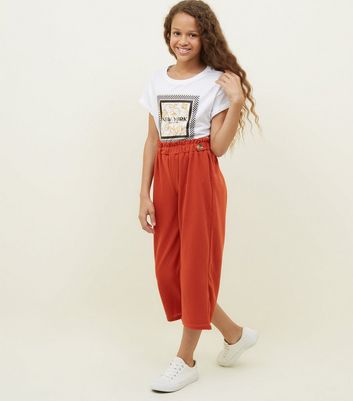 orange paperbag trousers