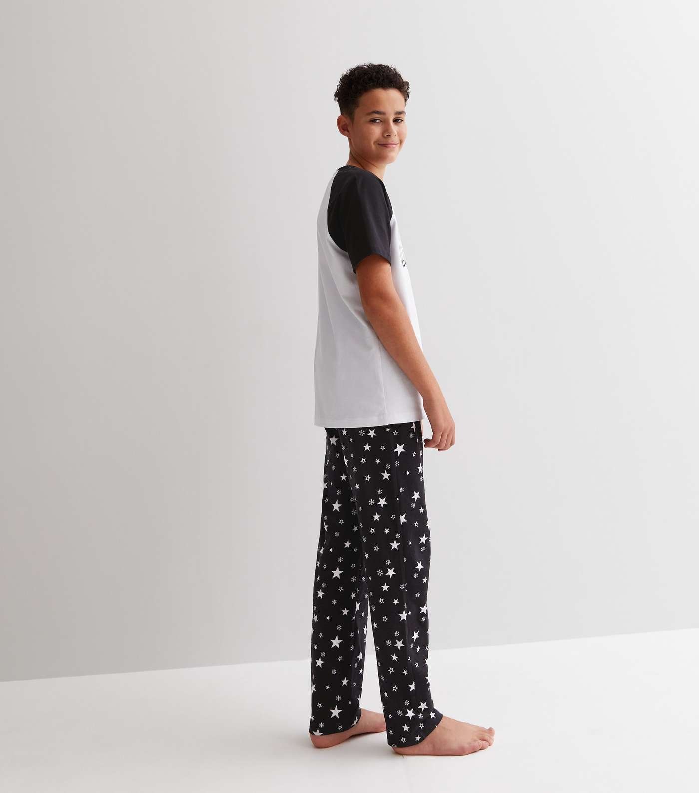 Boys Black Family Christmas Jogger Pyjama Set with Star Print Image 5