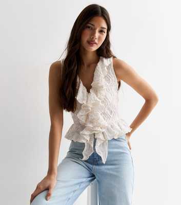 Off White Textured Ruffle Front Sleeveless Top