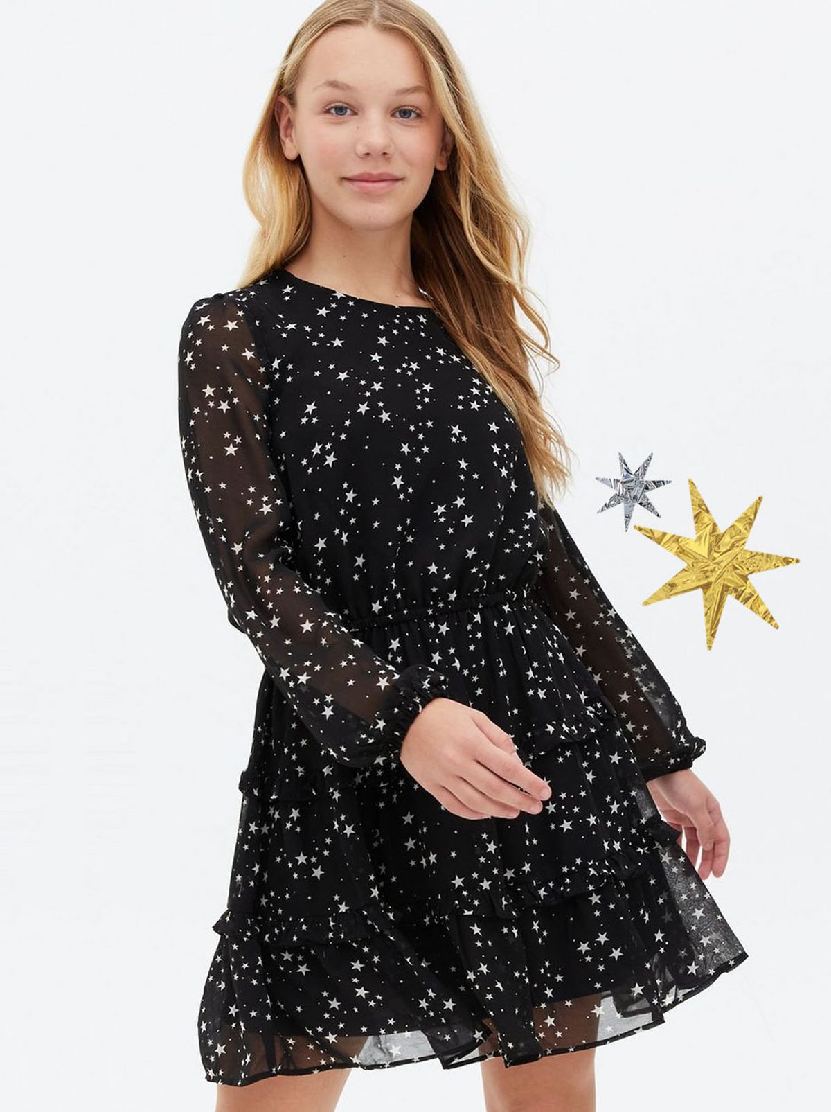 Girl wearing a black star chiffon mini dress