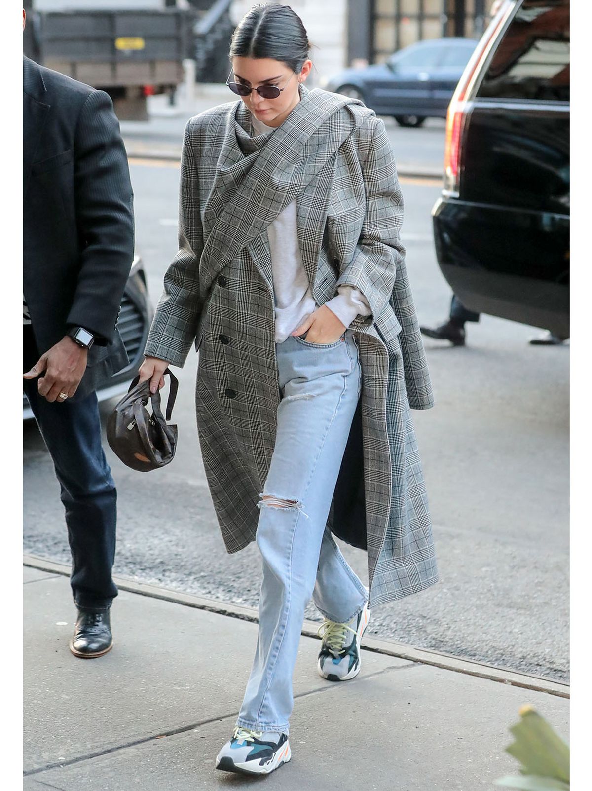 Kendall Jenner keeps it casual chic in all-grey hoodie and sweatpants while  checking out of