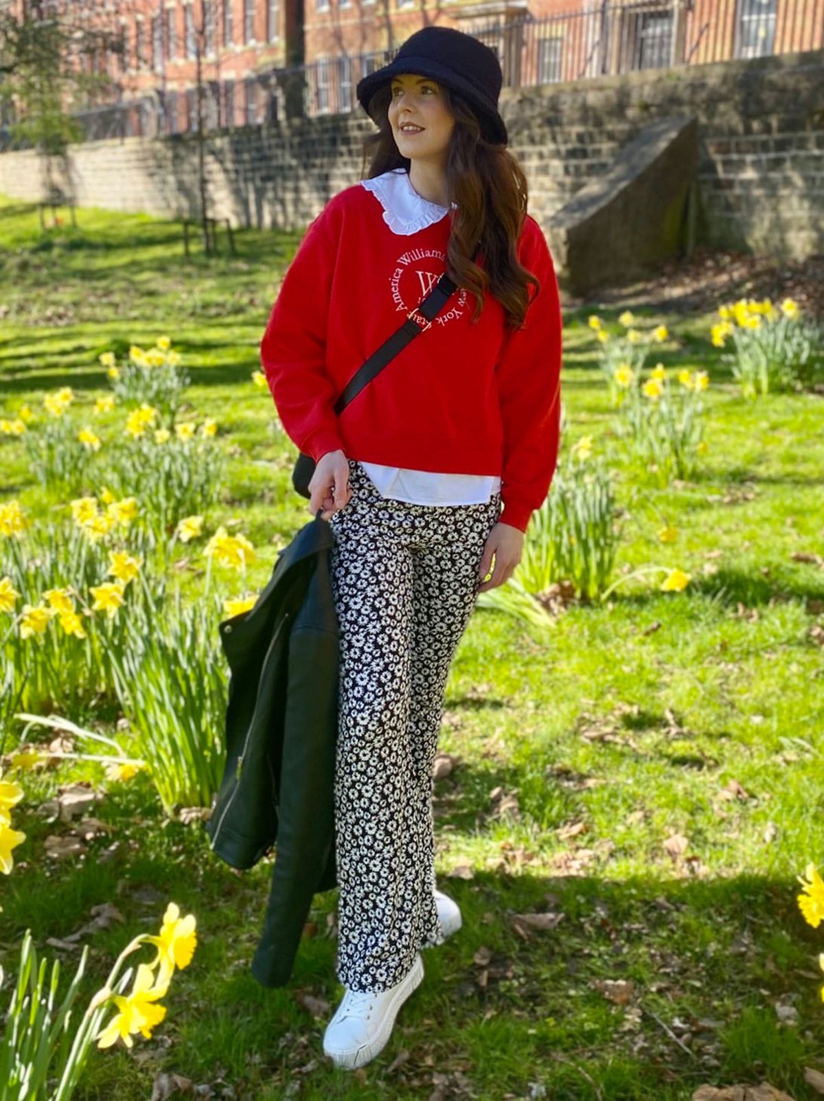 Lauren Turner, VM at New Look Preston wearing a red jumper, white blouse and daisy print flares