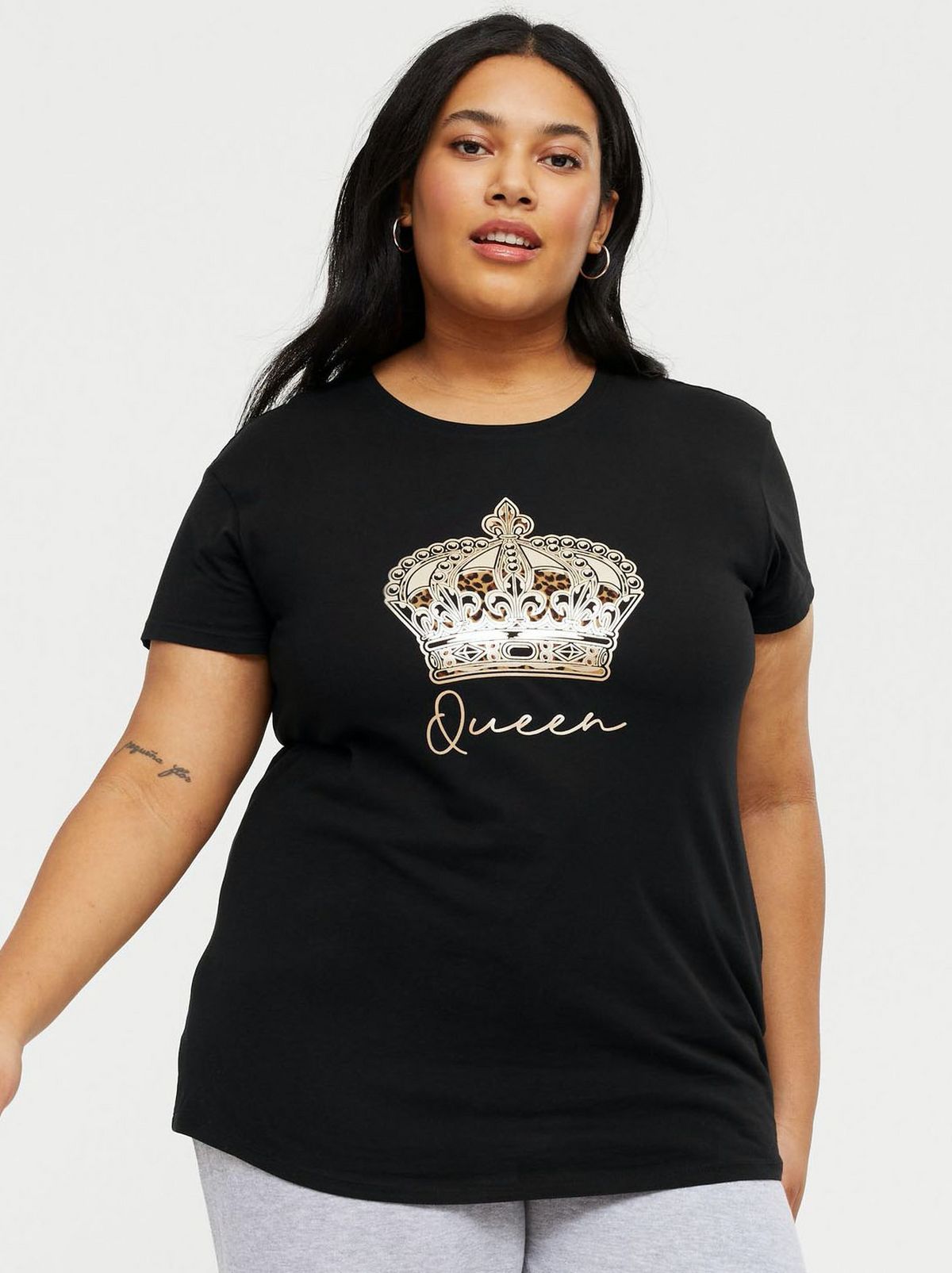 Lady wearing a black slogan t-shirt