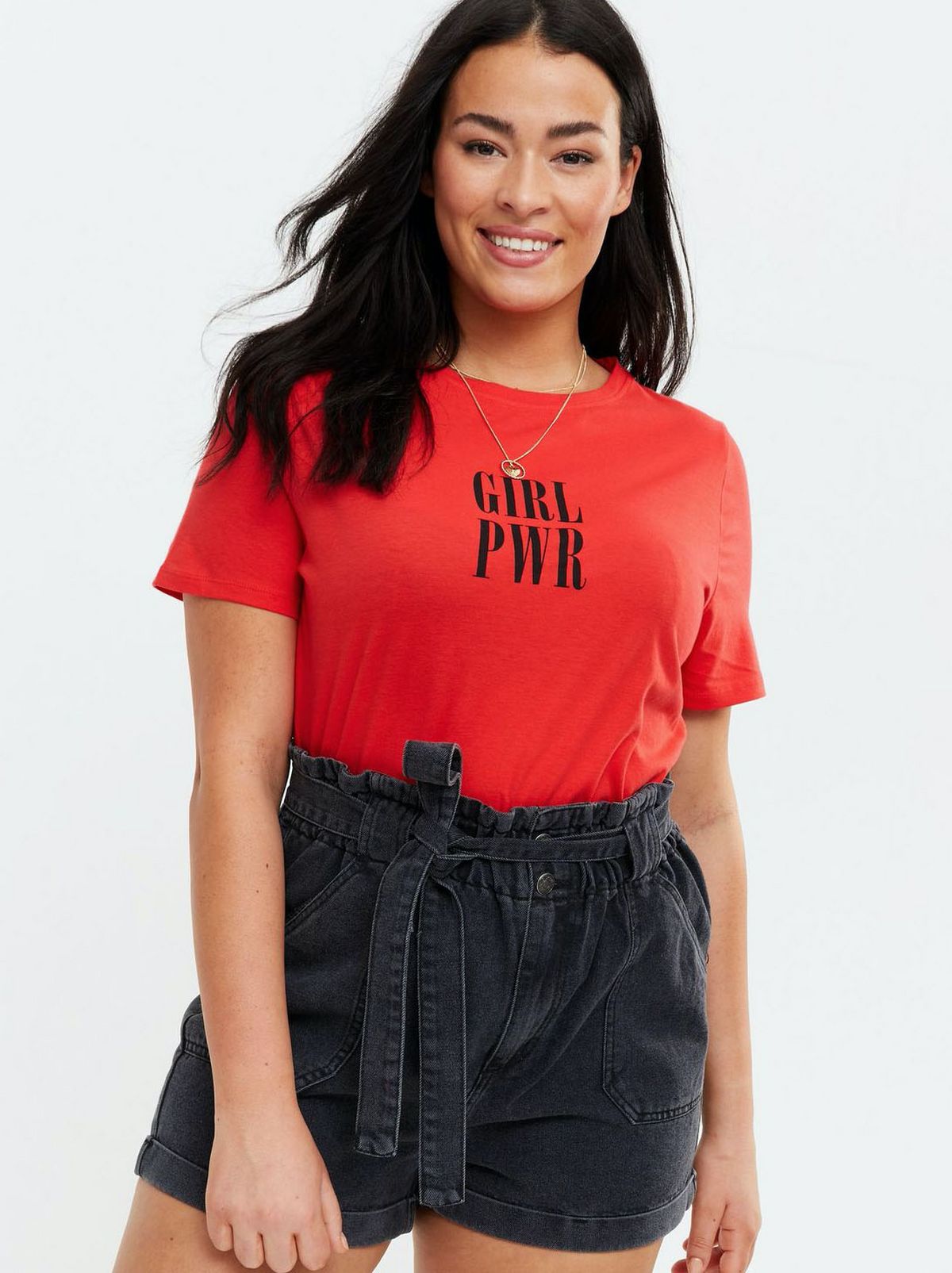 Woman wearing a red slogan t-shirt