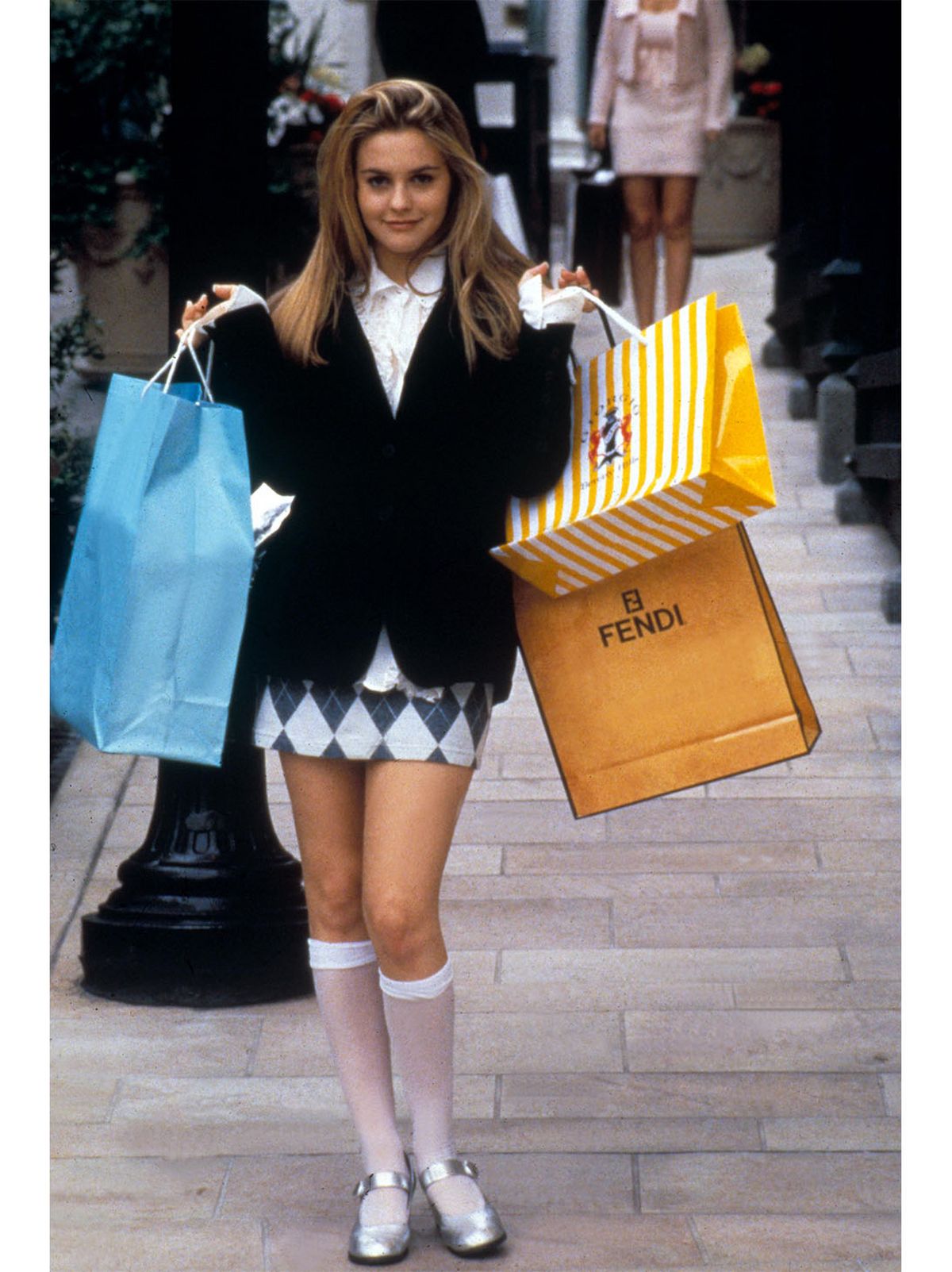 Alicia Silverstone wearing a patterned mini skirt in Clueless