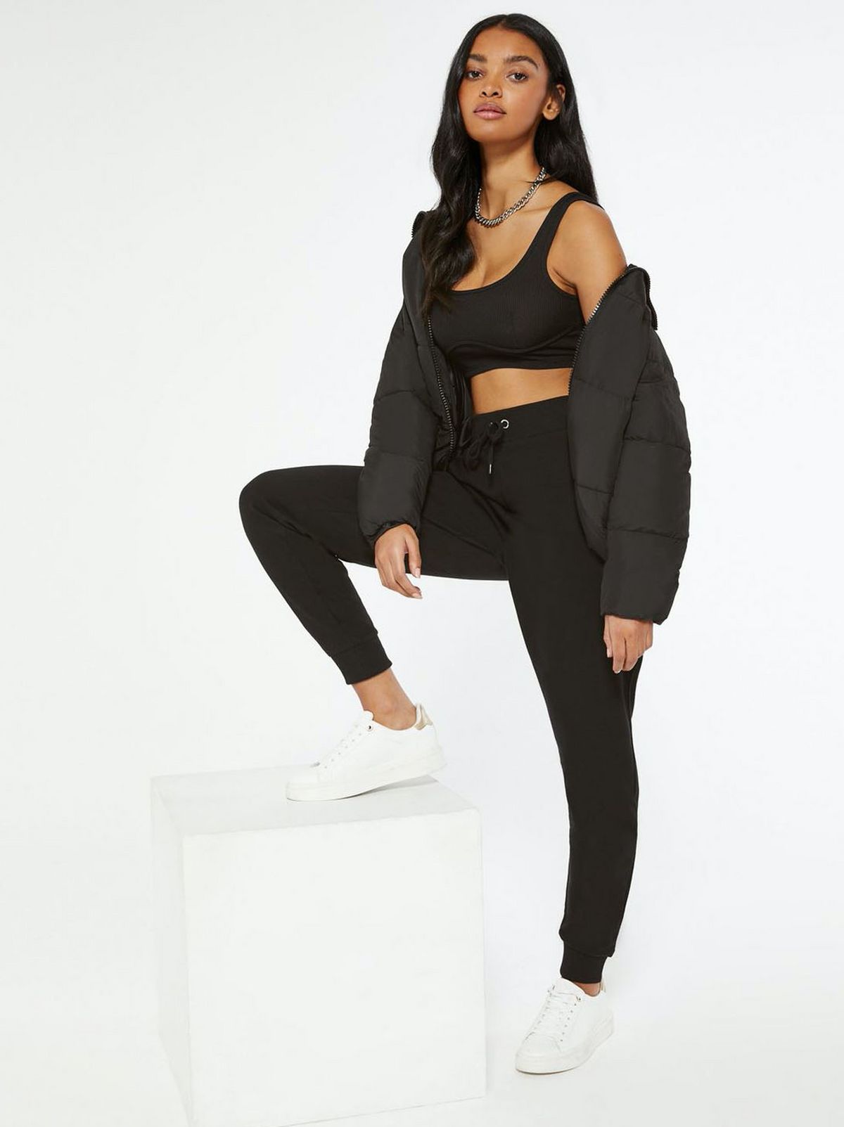 Woman Wearing Black Slim Leg Jersey Joggers