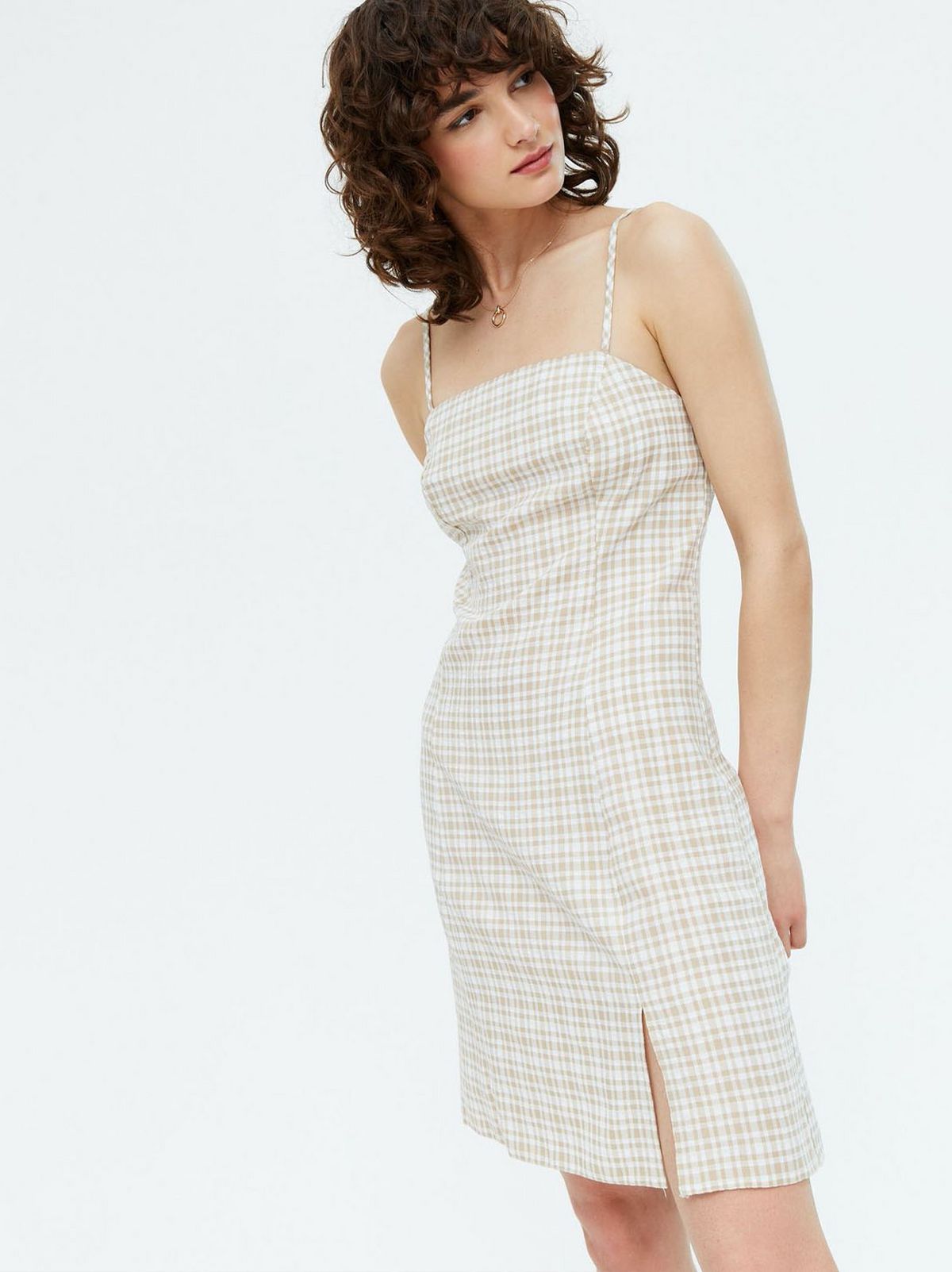 Woman wearing a Brown Check Split Mini Slip Dress