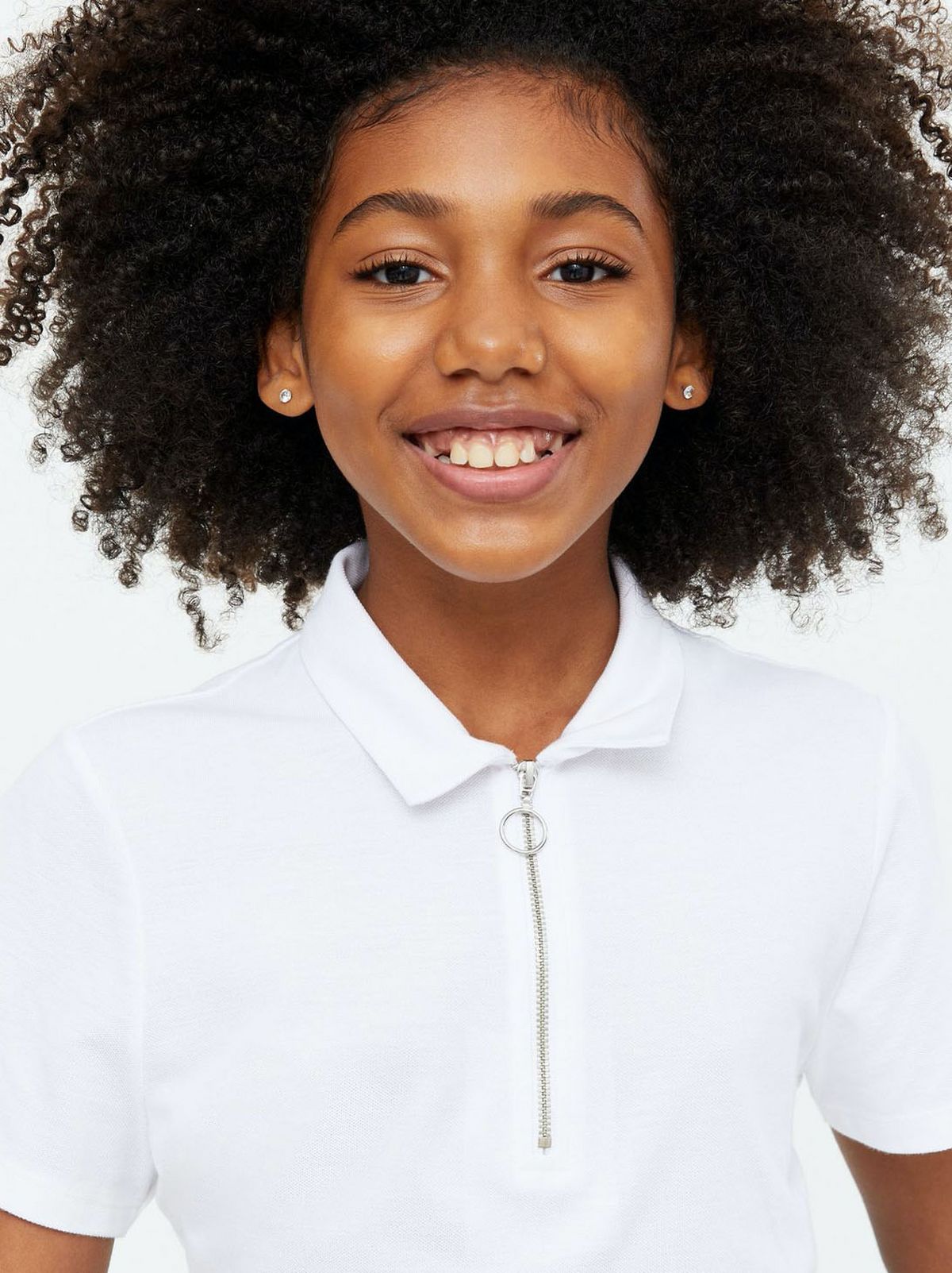 Girl wearing a white zip polo t-shirt