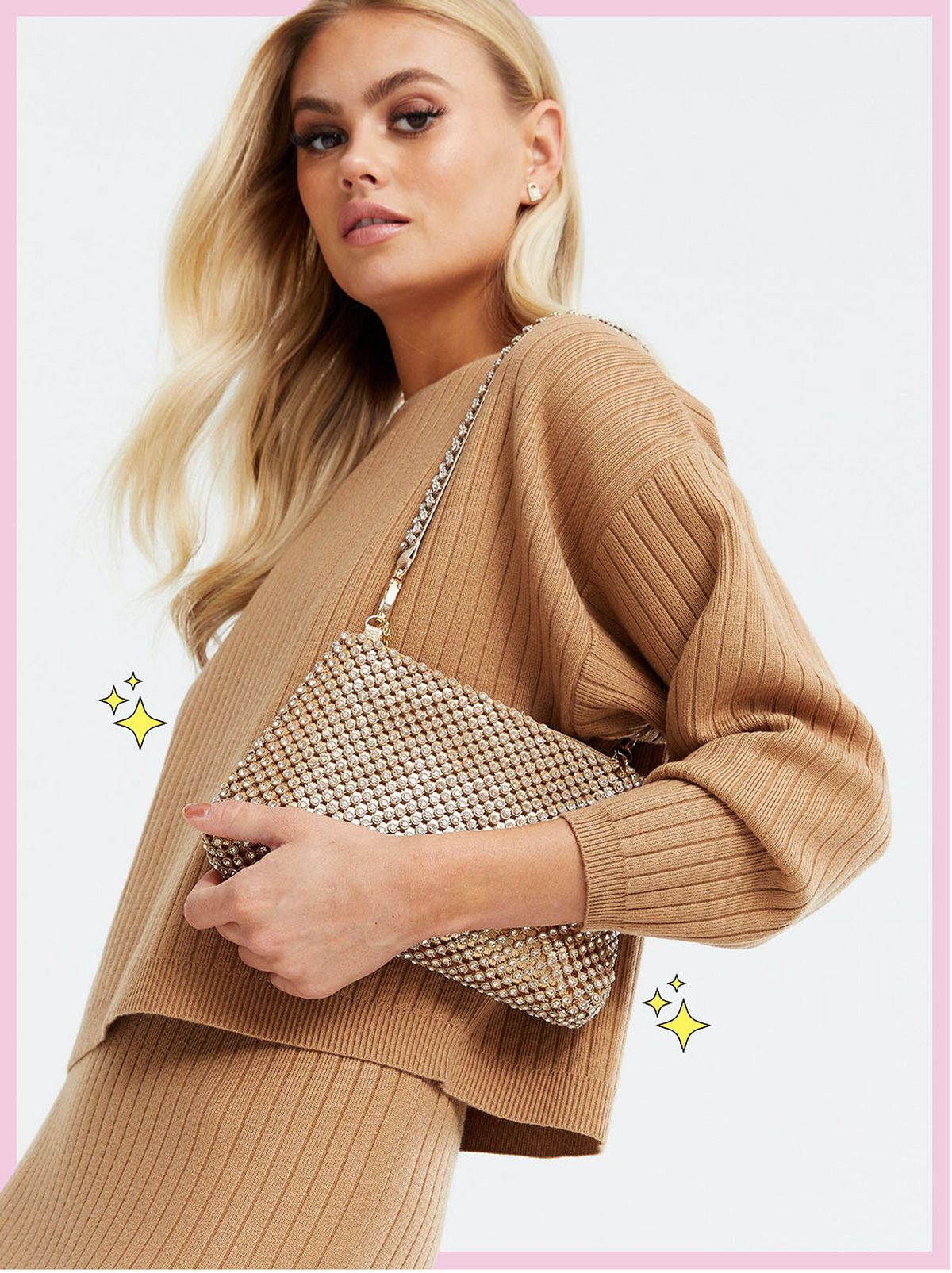 Woman carrying a gold diamanté cross body bag wearing a camel jumper and skirt