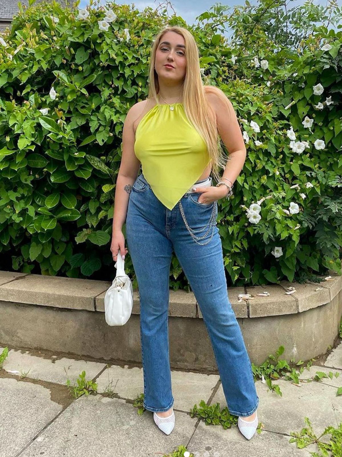 New Look's Sophie-Marie Richards wearing blue jeans and a yellow top