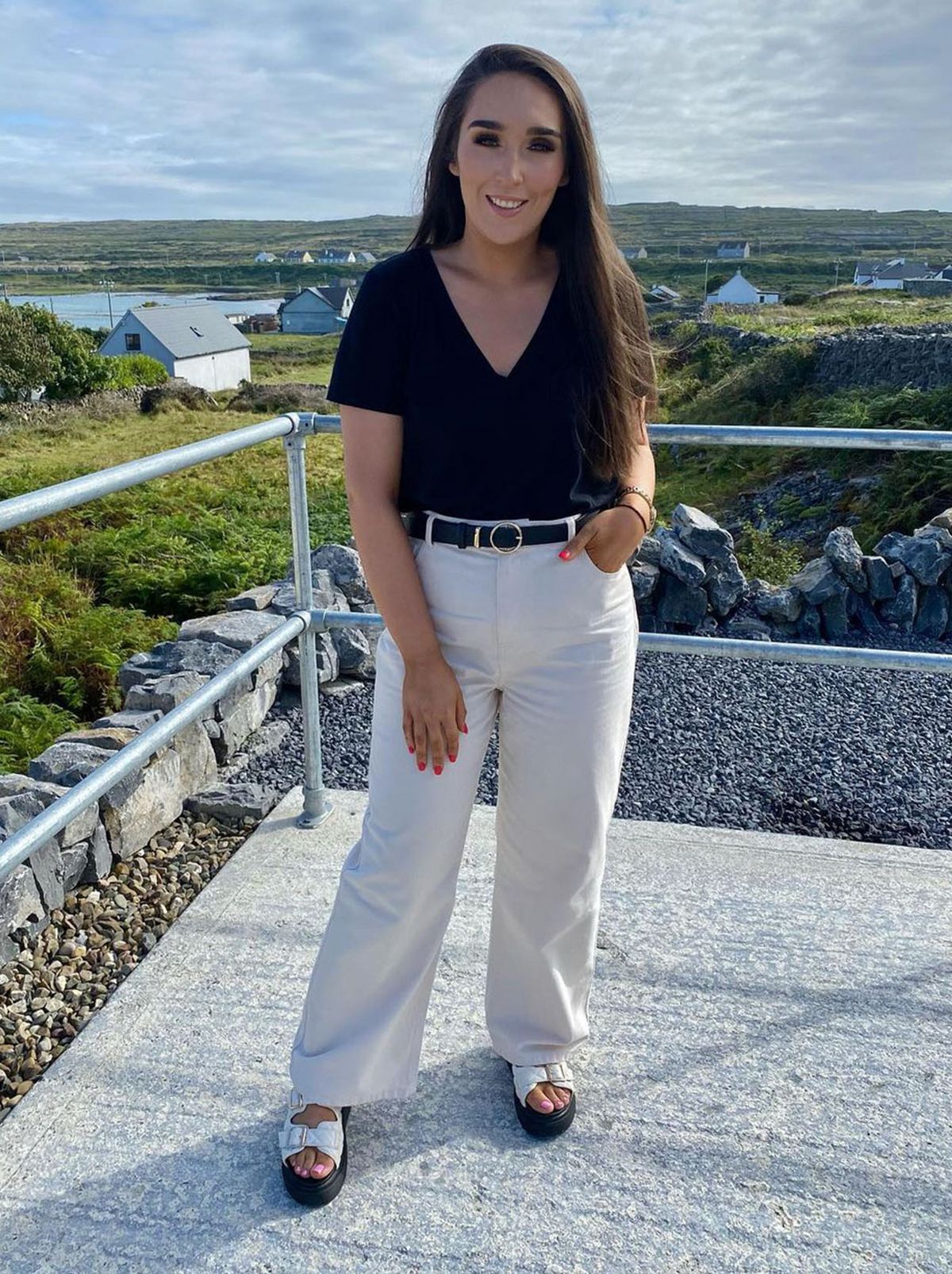 New Look's Denise Brophy wearing cream jeans and a black t-shirt