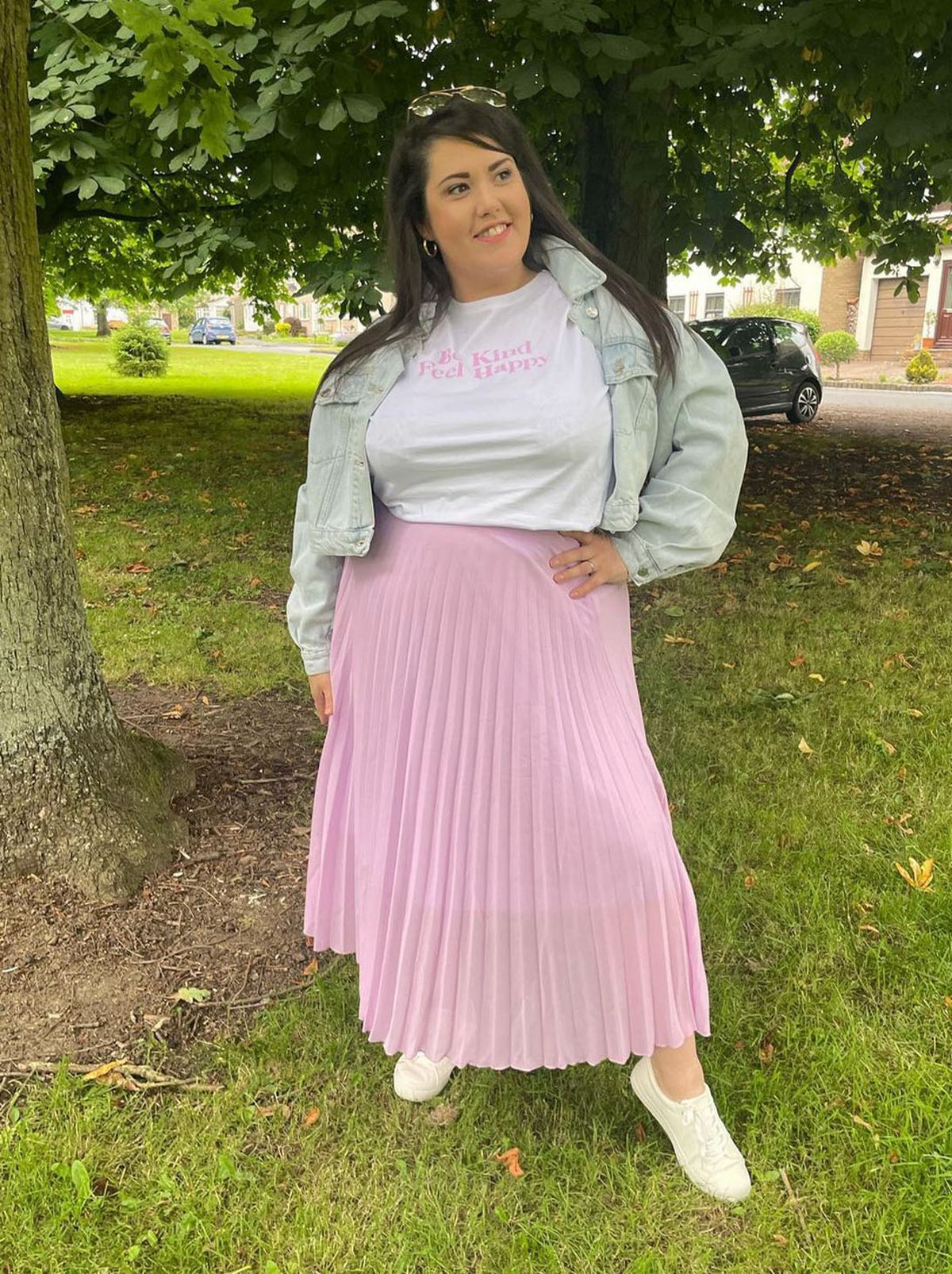 New Look's Laura Henderson wearing a pink maxi skirt, white t-shirt and jacket