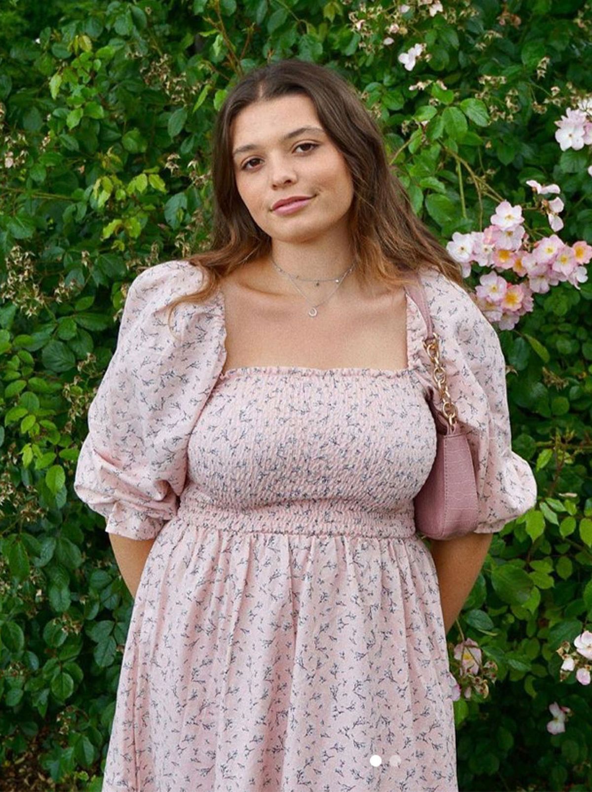 New Look's Kasey Walsh wearing a pale pink puff sleeve dress