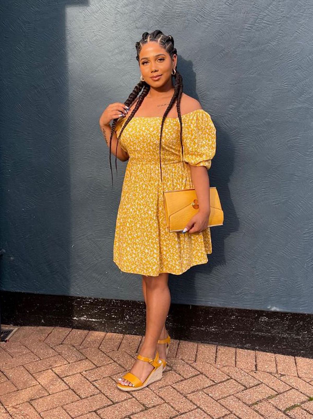 New Look's Shanuja loganathan wearing a yellow puff sleeve dress