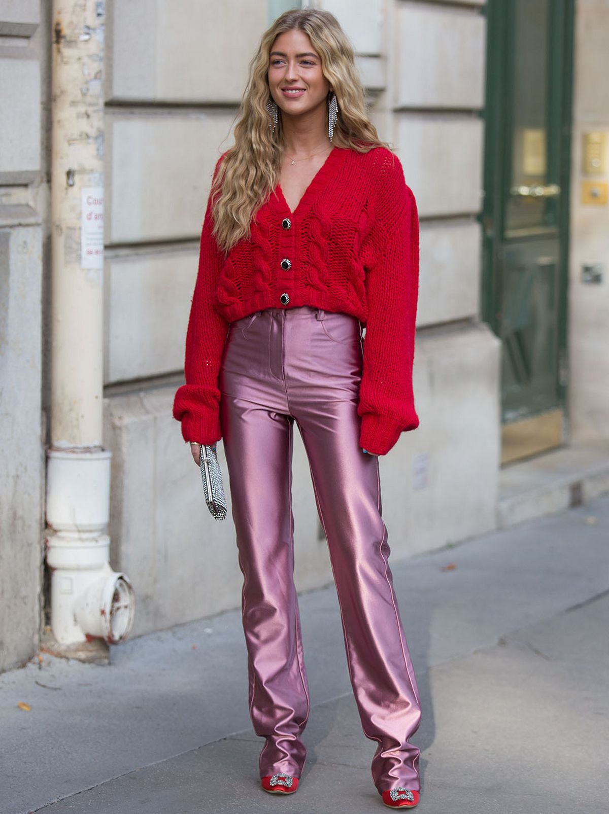 Emili Sindlev wearing a pink chunky cardigan