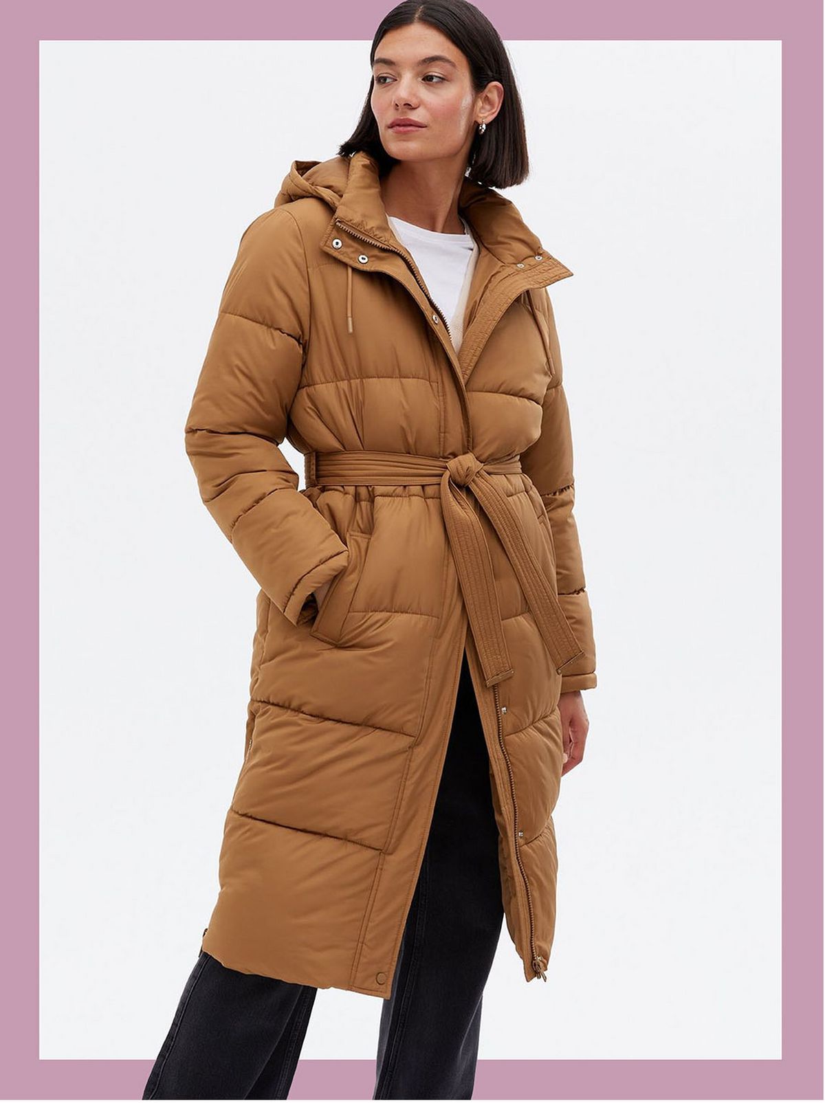 Woman wearing a Tan Belted Long Puffer Jacket
