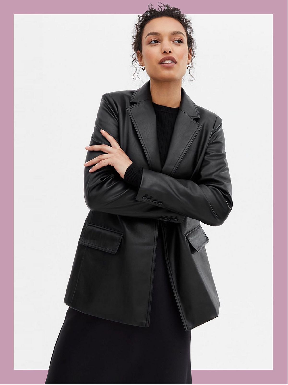 Woman wearing black leather look blazer