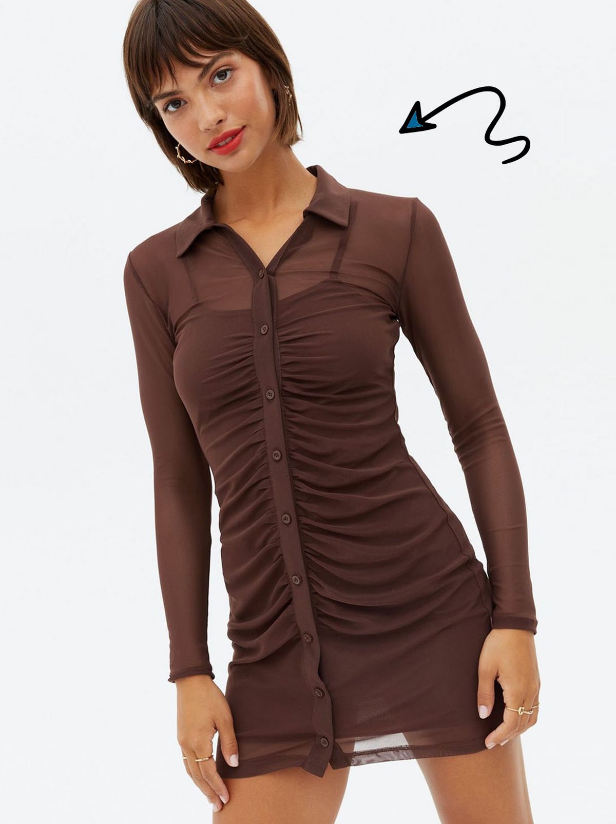 Woman wearing a light brown mesh bodycon dress