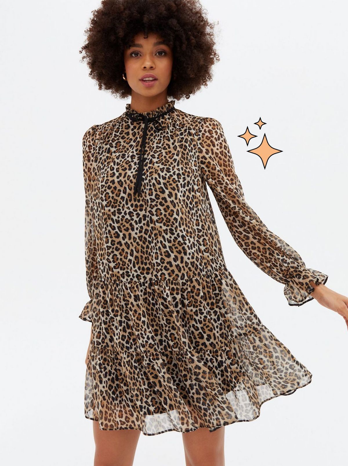 Woman wearing a brown leopard print mini smock dress