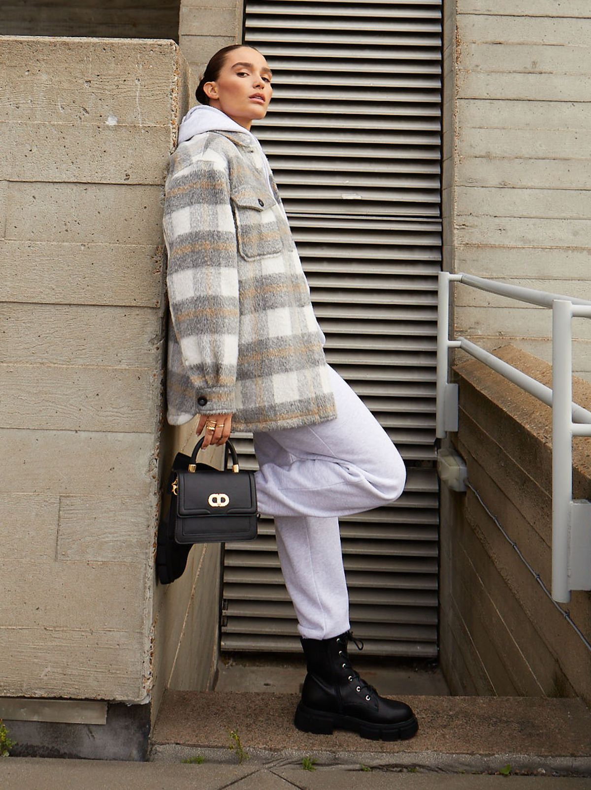 lissy roddy wearing a checked shacket