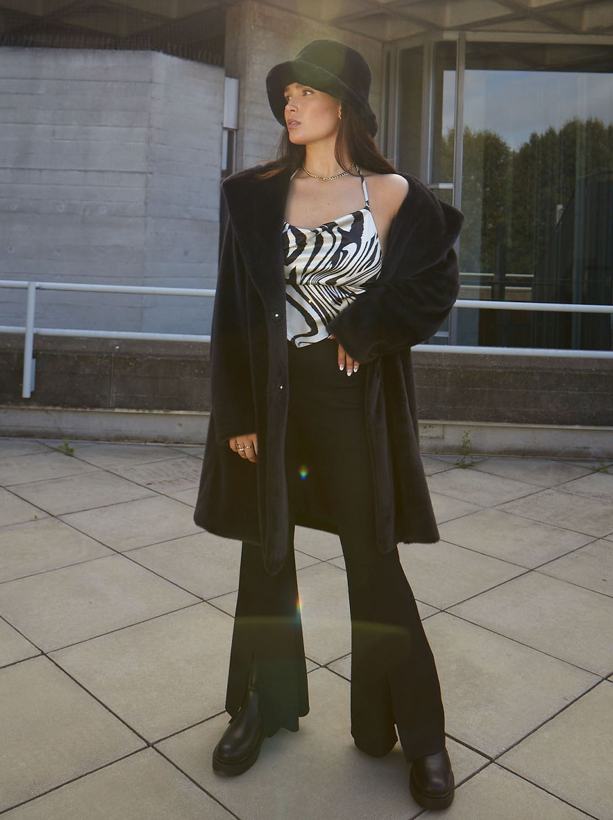 lissy roddy wearing a faux fur coat