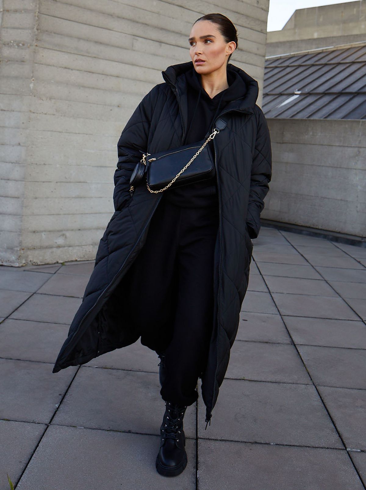 lissy roddy wearing a longline puffer coat