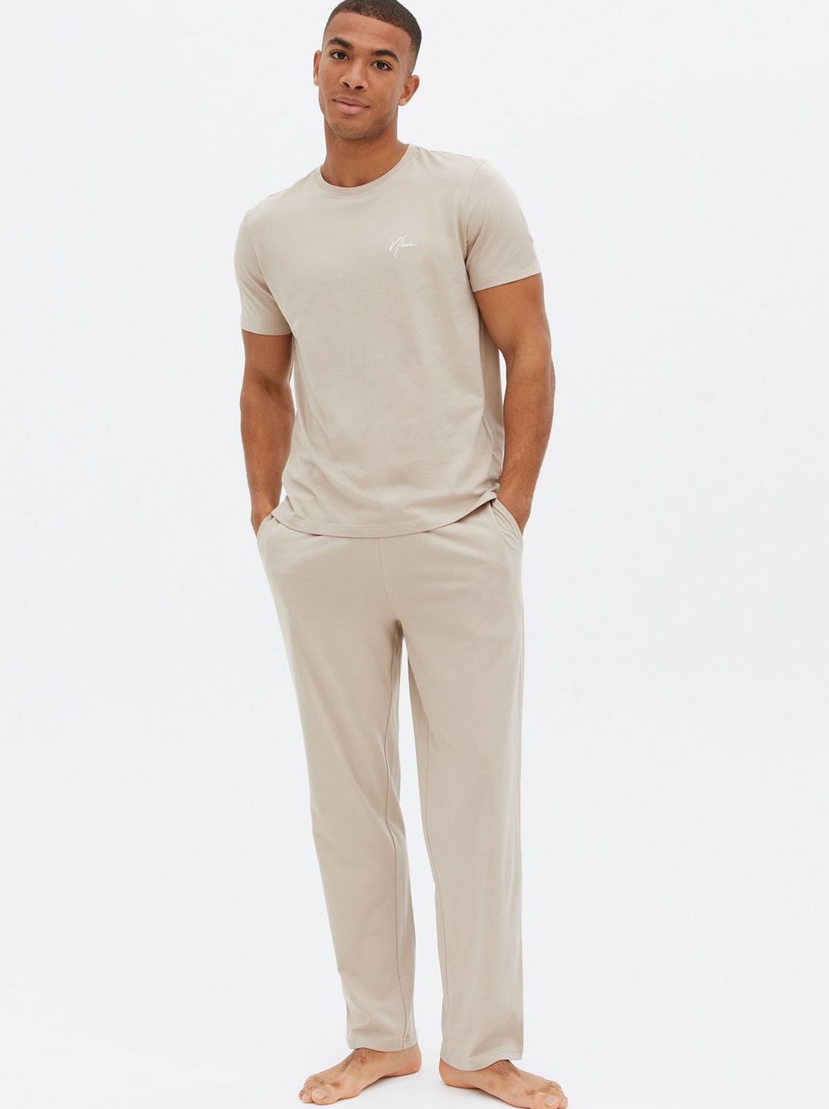 Man wearing a stone t shirt and jogger set
