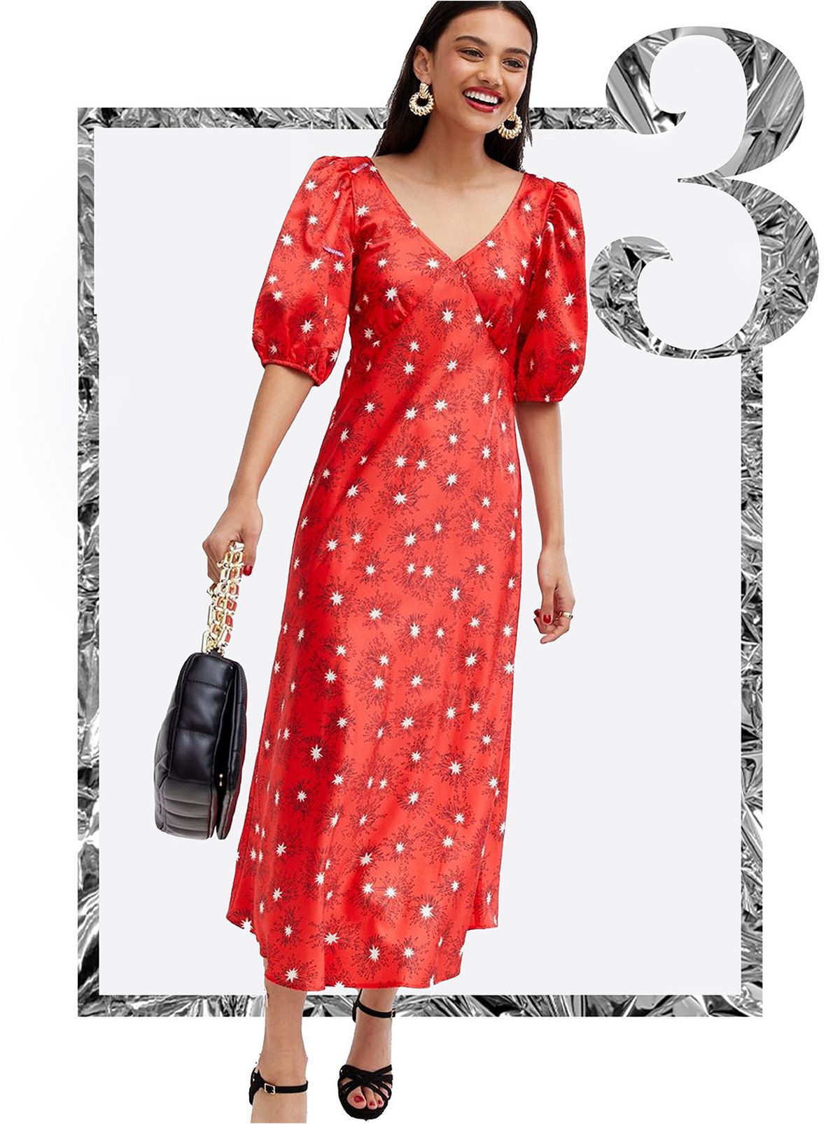 Woman wearing a red star satin tie back midi dress