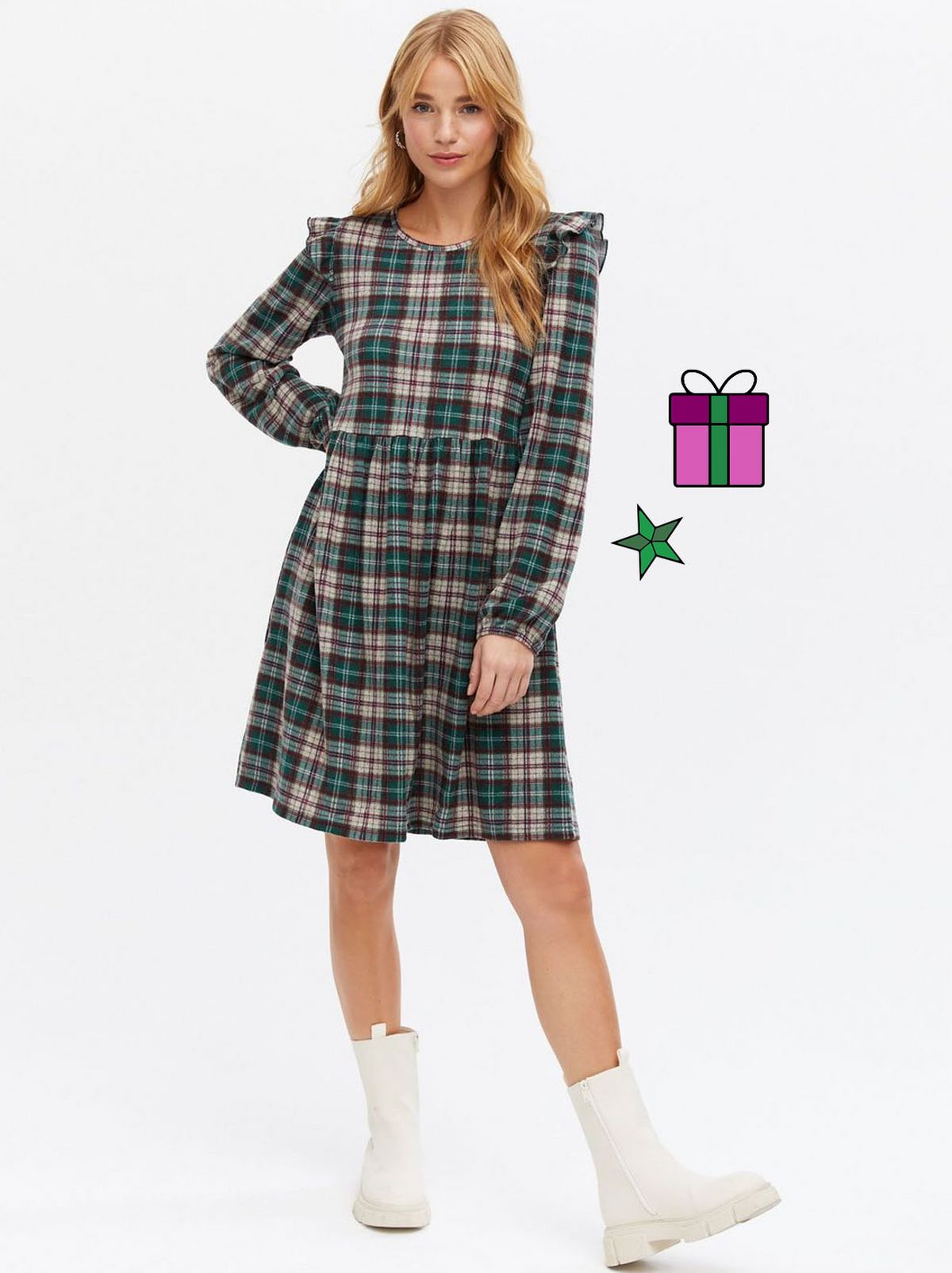 Woman wearing a  green check oversized smock dress	