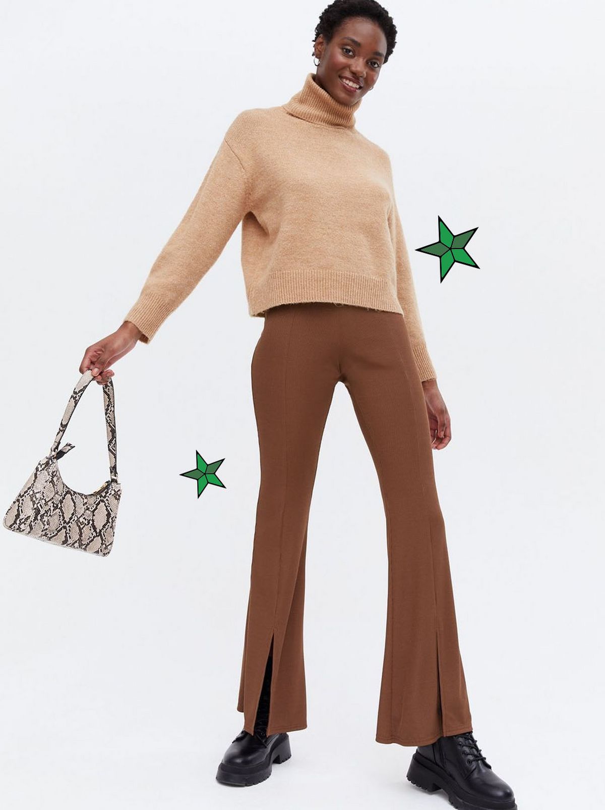 Woman wearing a brown ripped split front flared trousers	