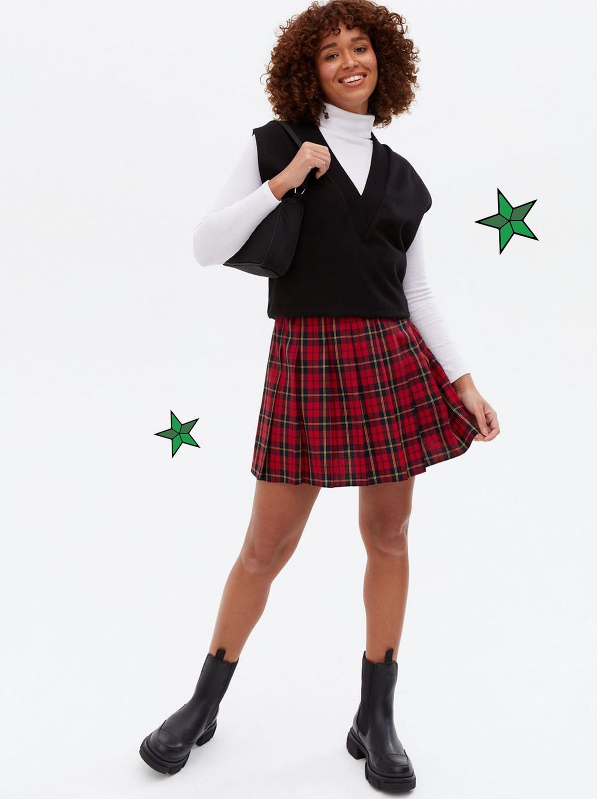 Woman wearing a red tartan tennis skirt	