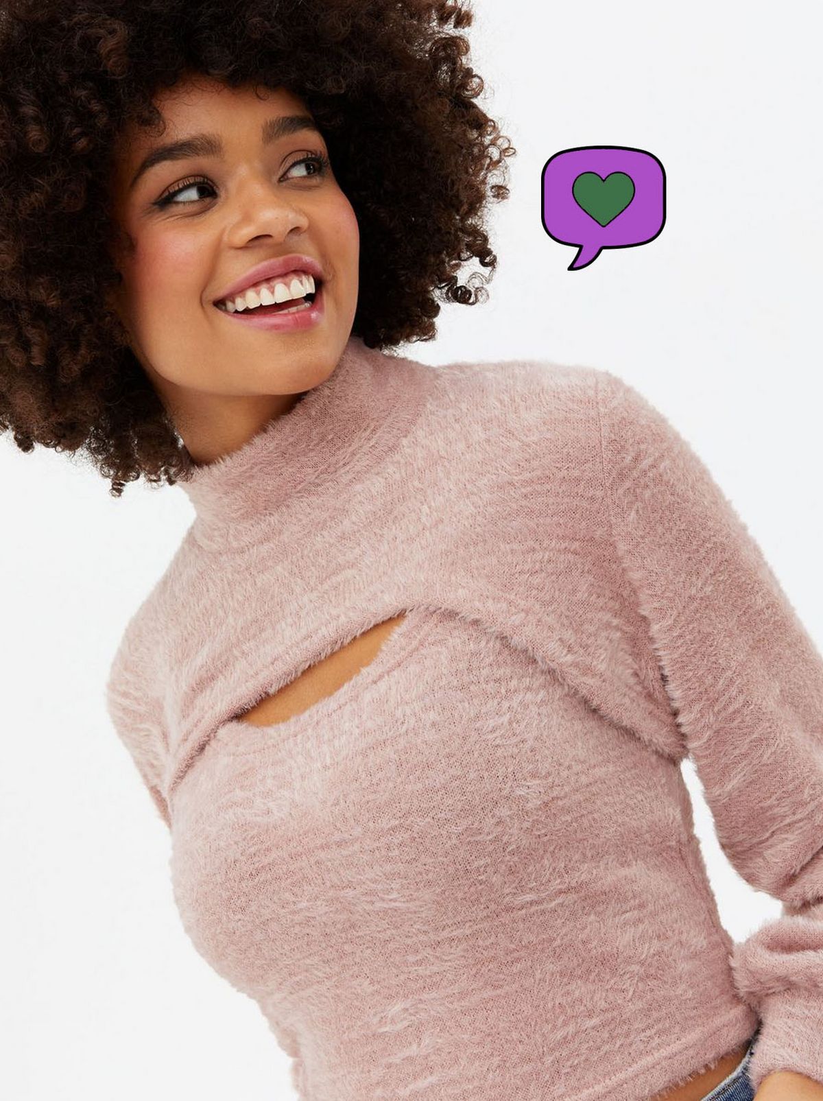 Woman wearing a pink knit fluffly jumper and vest	
