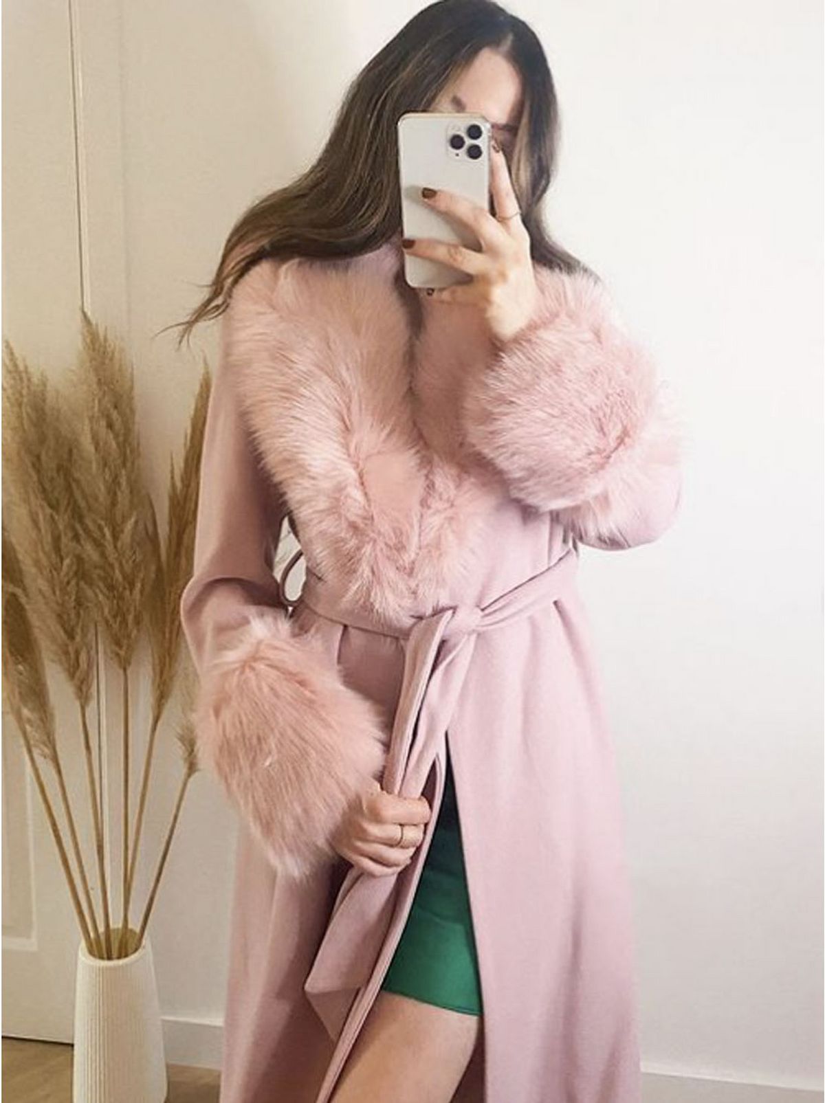 Hannah Rebecca wearing a blush pink faux fur coat 	