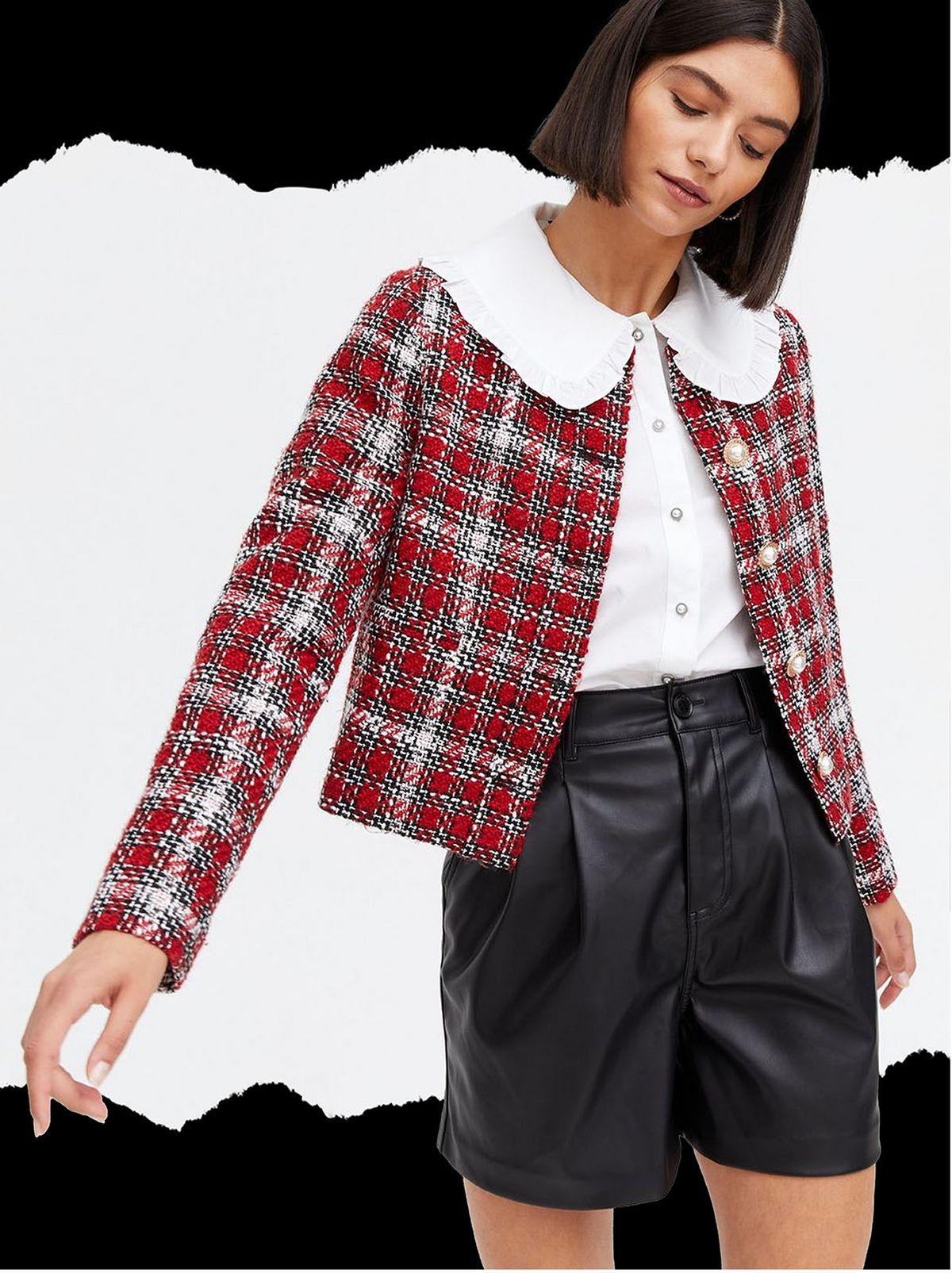 Woman wearing a red check crop jacket