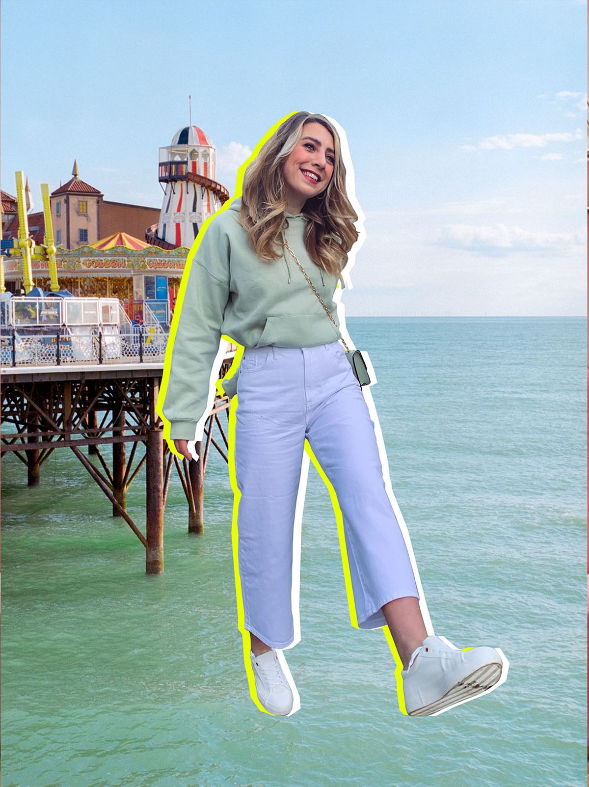Alexx Hughes wearing sage green hoodie, white jeans and white trainers