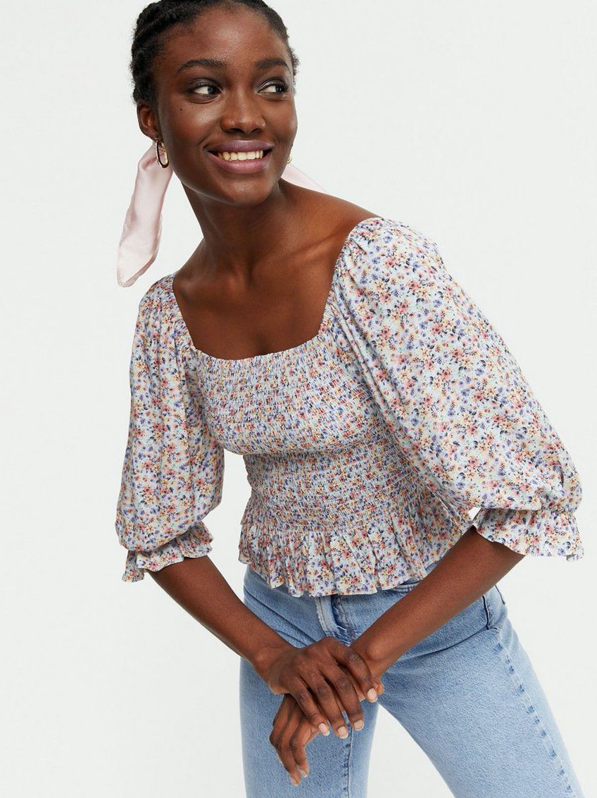 Woman wearing a Ditsy Floral Print Blouse