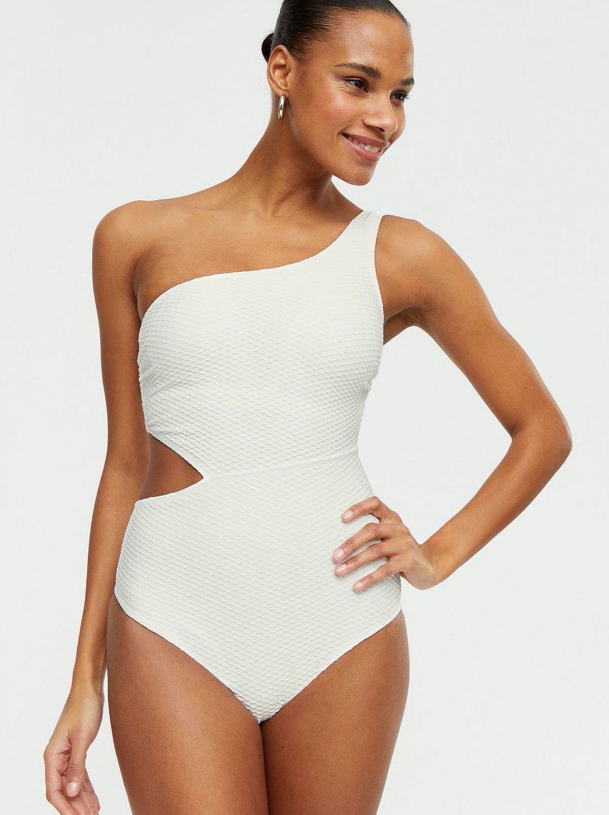 Woman wearing a White Textured Swimsuit
