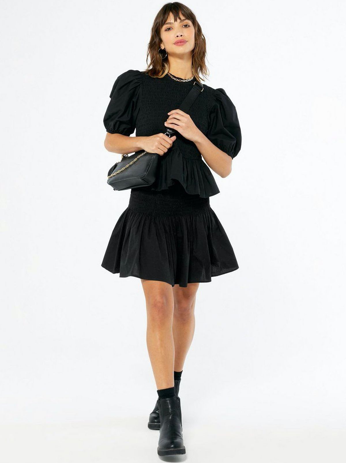 Woman wearing a Black Cotton Mini Skirt