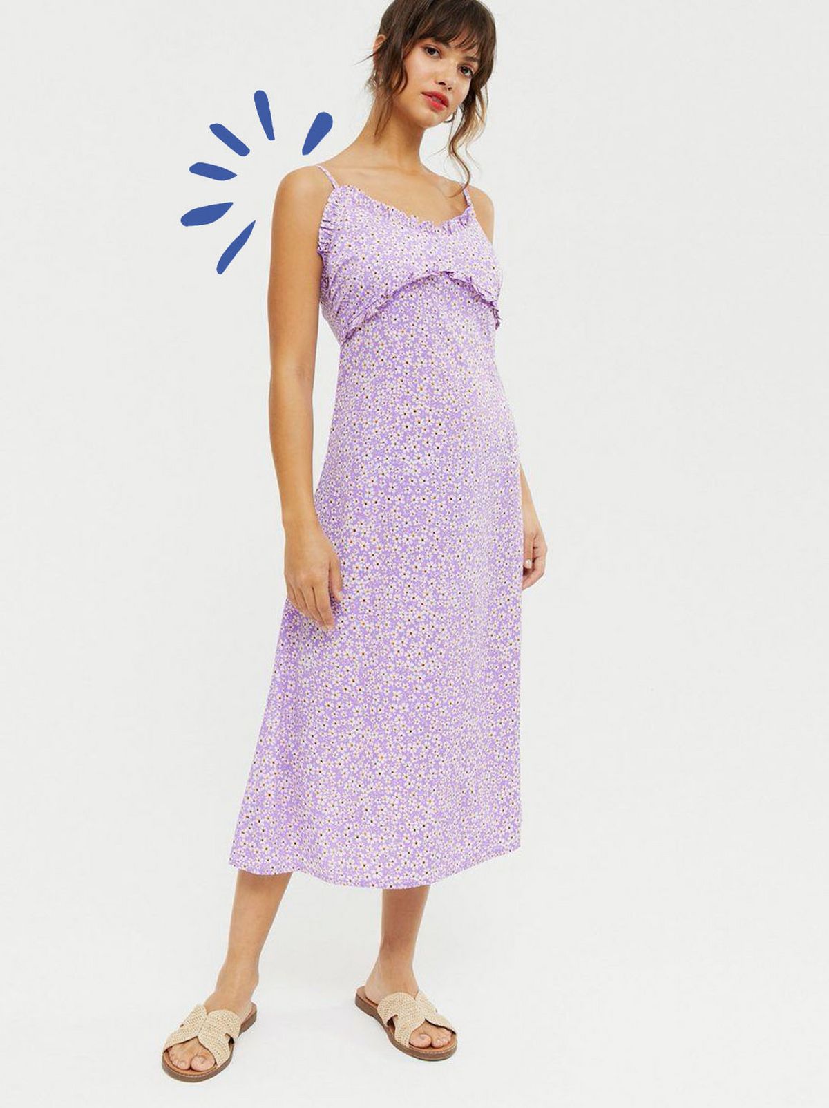 Woman wearing purple floral frill midi slip dress