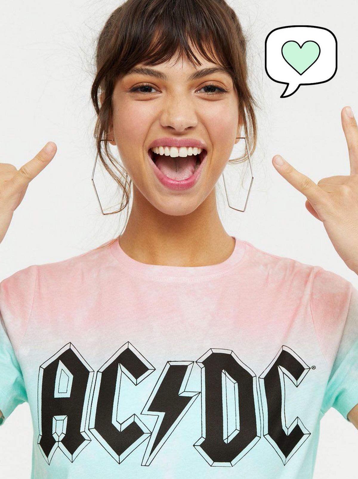 Woman wearing multicoloured tie dye ACDC logo oversized t-shirt