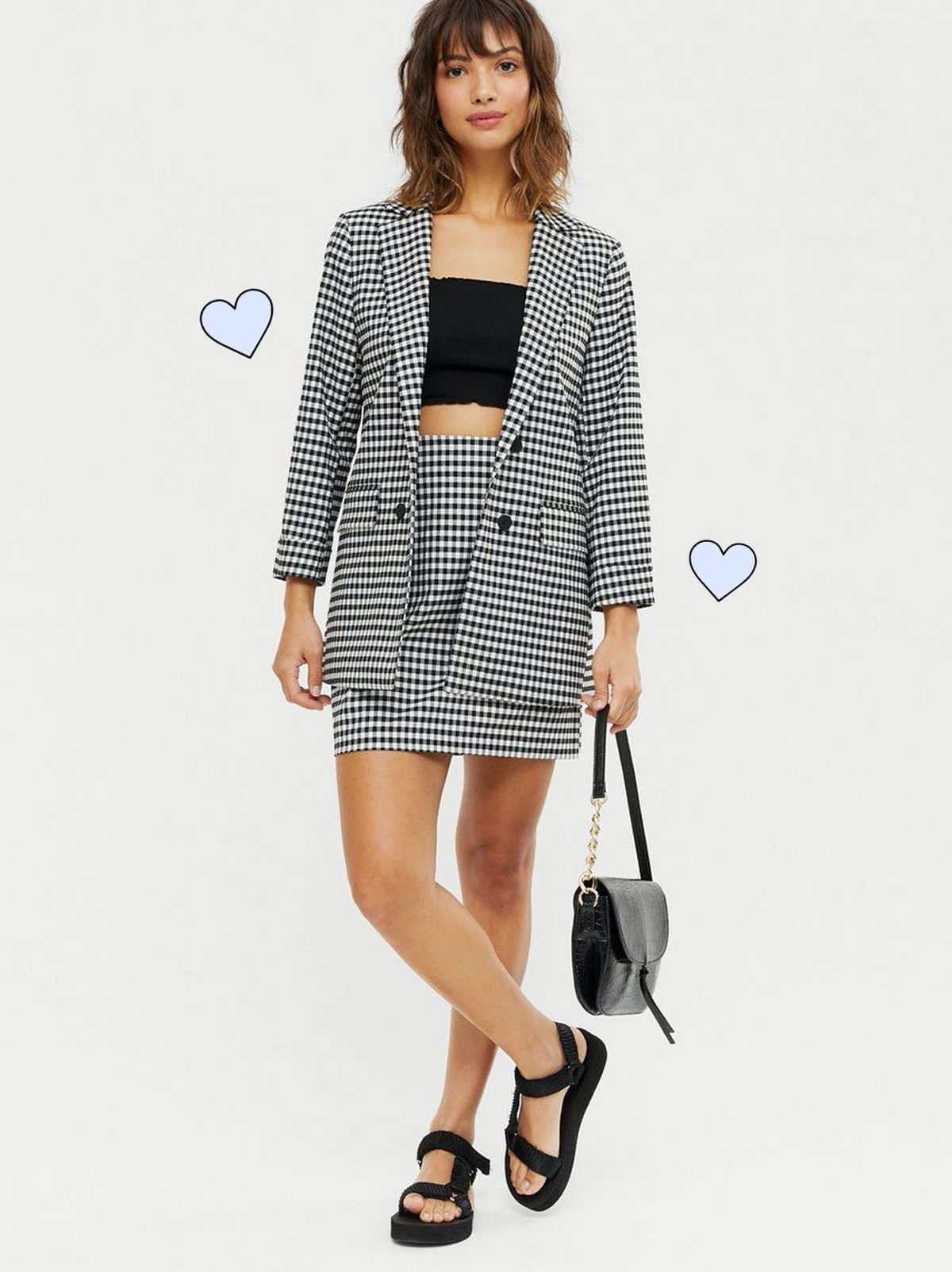 Woman wearing black gingham high waist a-line skirt and matching jacket