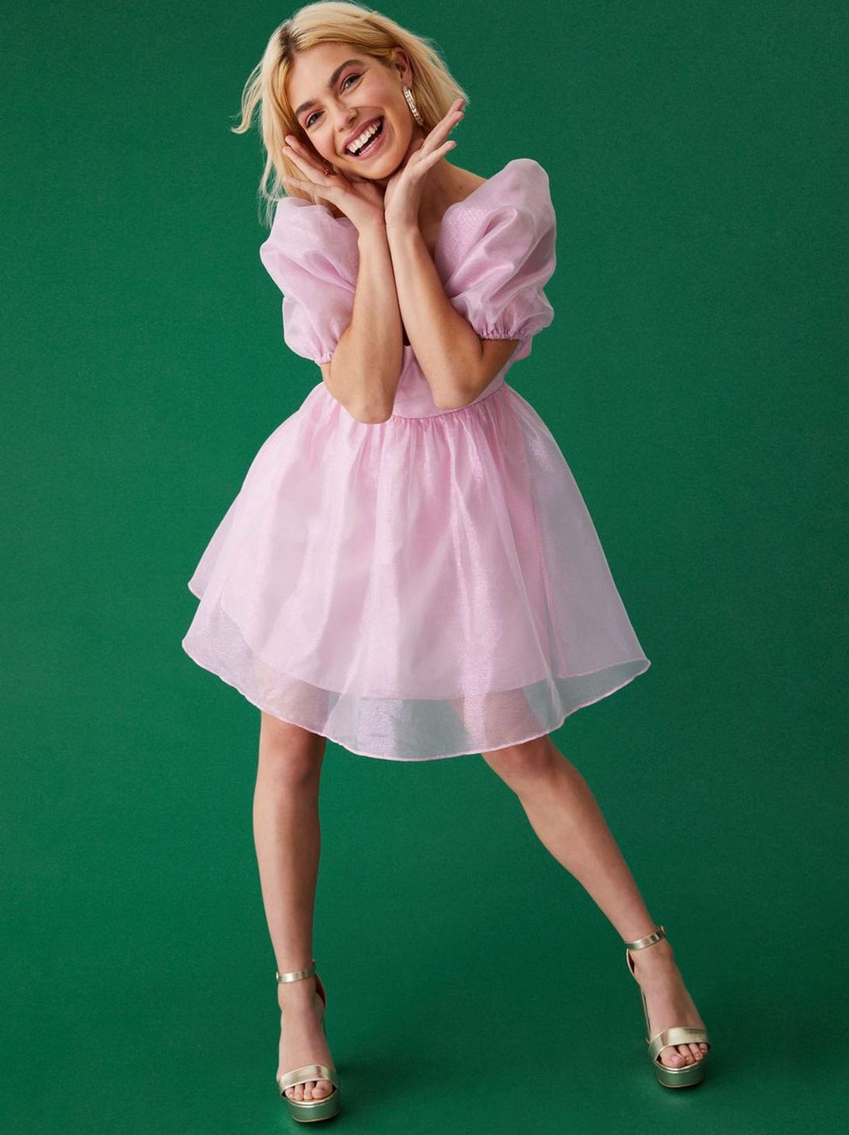 Woman wearing a Pretty in Pink Organza Puff Sleeve Dress