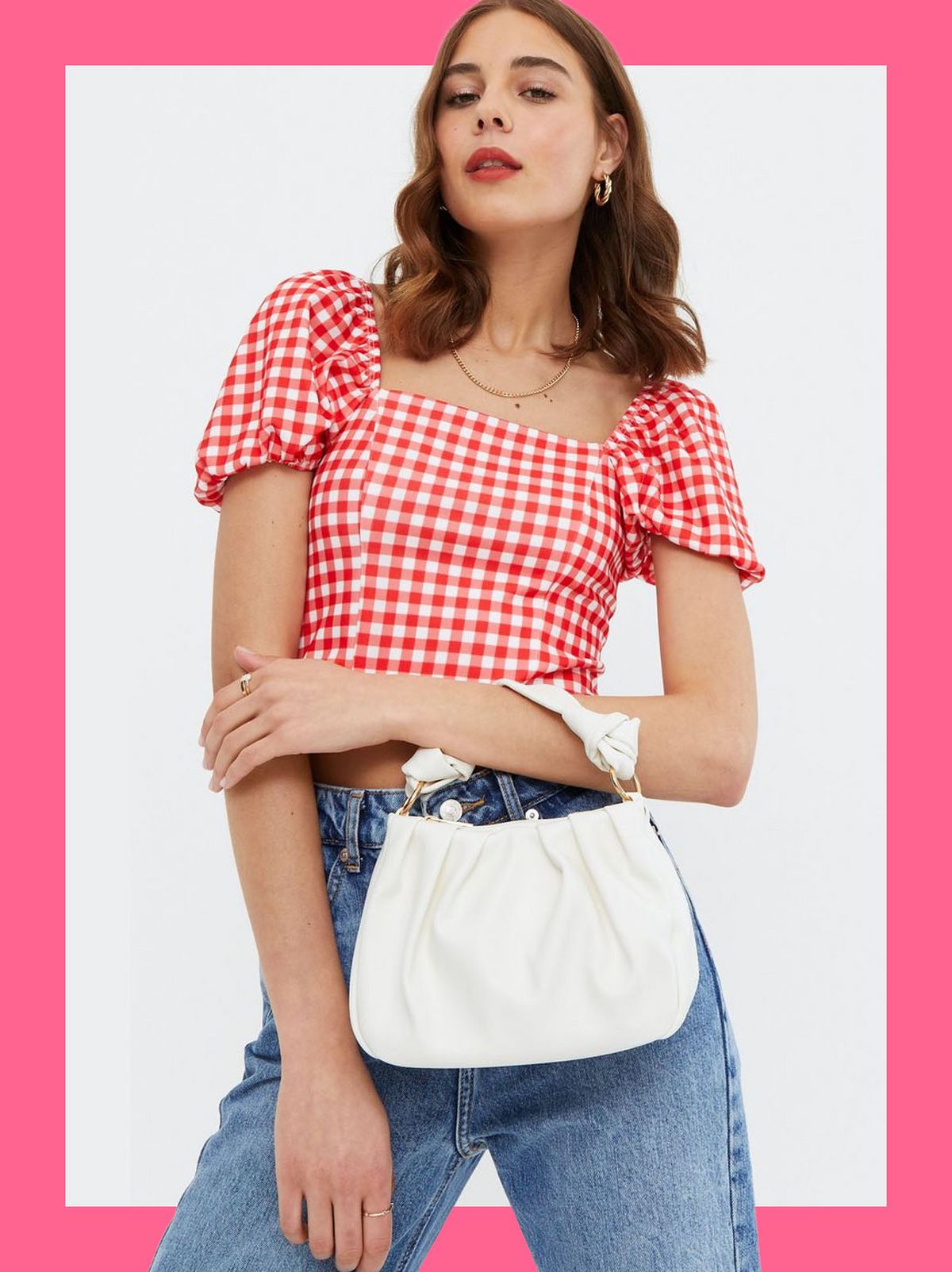 Woman wearing a knot crossbody bag
