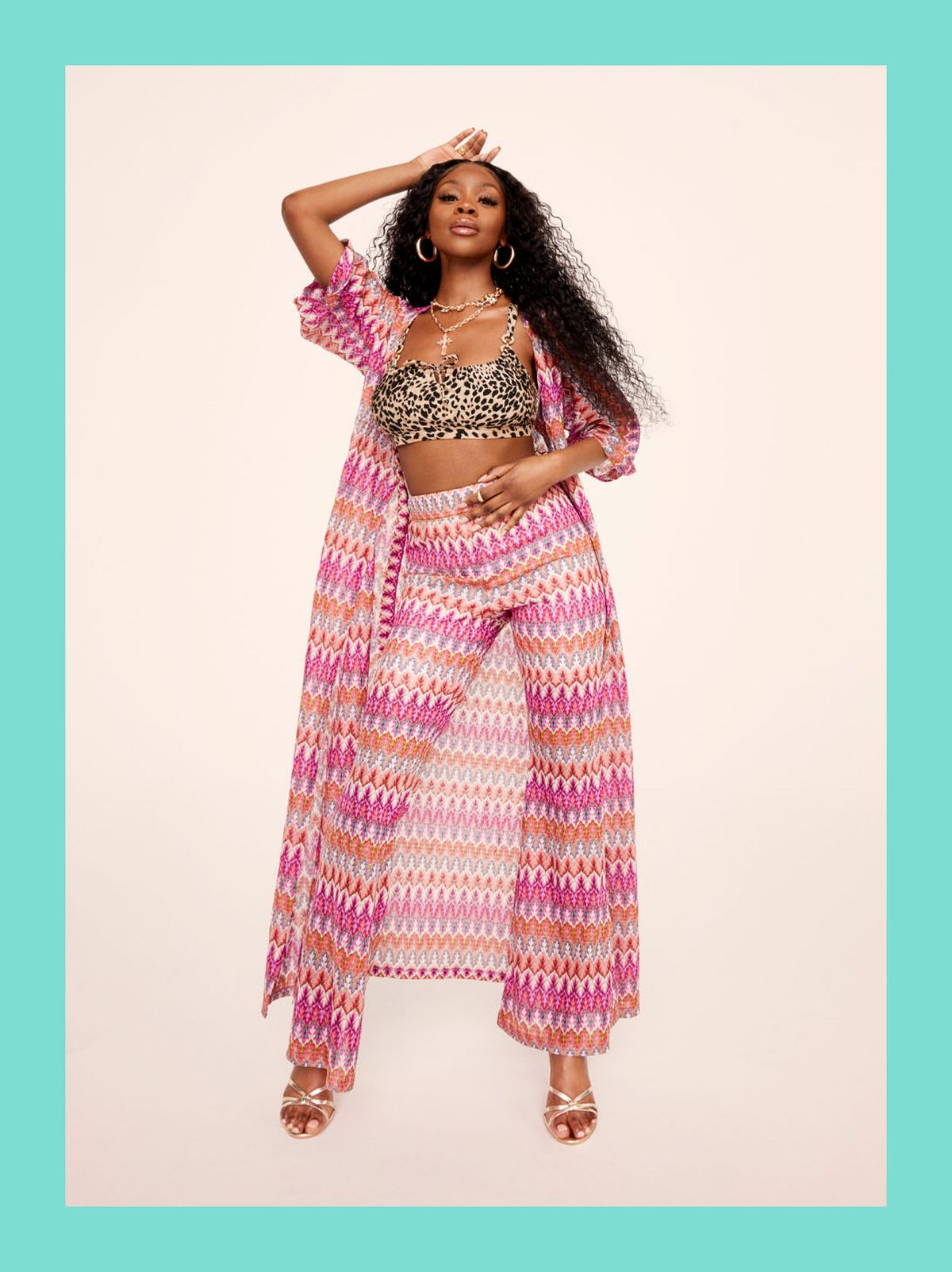 Sarah Malen in A Short Patterned Top and A Pink and Yellow Patterned Co Ord Long Top and Skirt